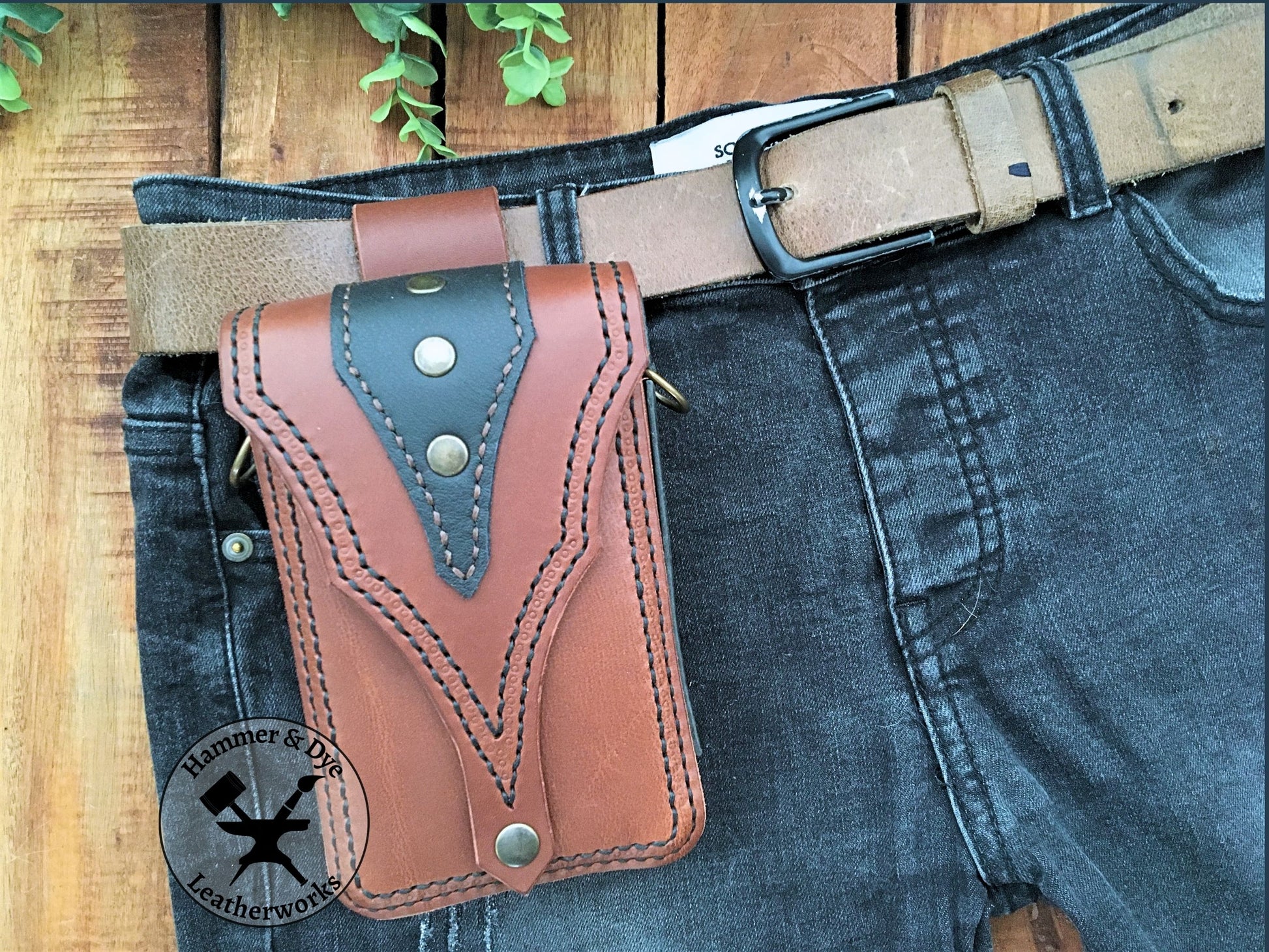 Brown Biker Style Leather Belt Pouch with Black details on a trouser belt