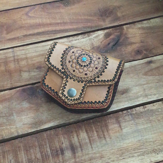 Video showing a Handmade Boho Style Mini Leather Hip Bag with Turquoise detailing