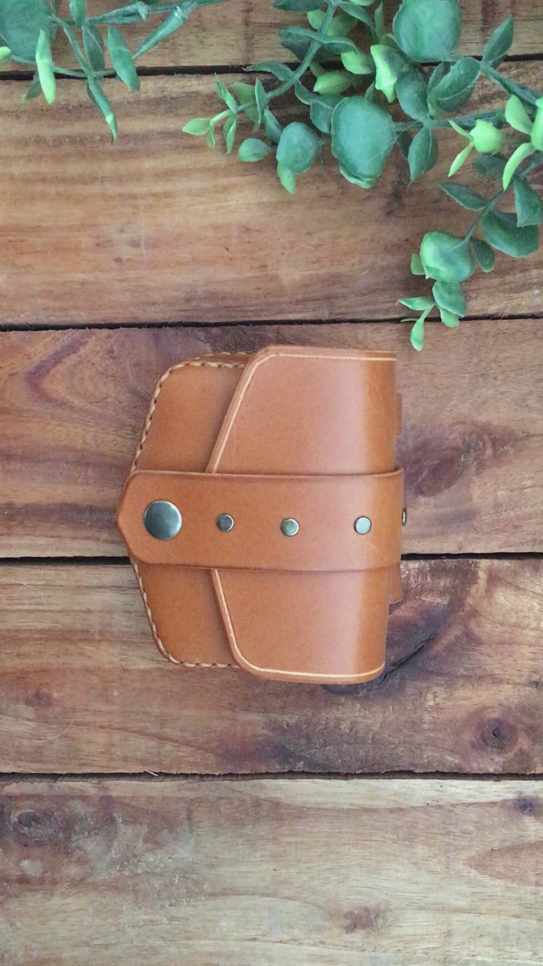 Video showing a Handmade Cognac Color Mini Leather Belt Pouch for credit cards