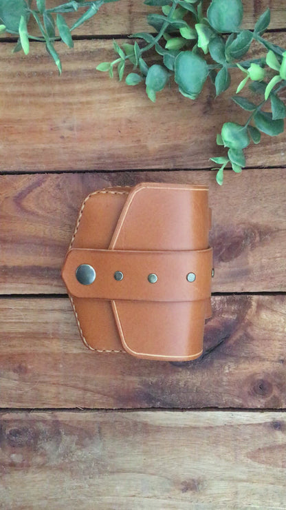 Video showing a Handmade Cognac Color Mini Leather Belt Pouch for credit cards