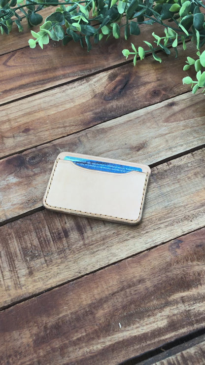 Video showing the Handmade Minimalist Natural Leather Card Wallet with Hazel Stitching