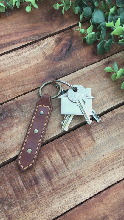 Video Showing a Handmade Brown Leather Studded Keychain with Hazel Stitching