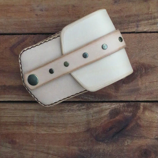 Video showing a Handmade Undyed Mini Leather Belt Pouch for credit cards
