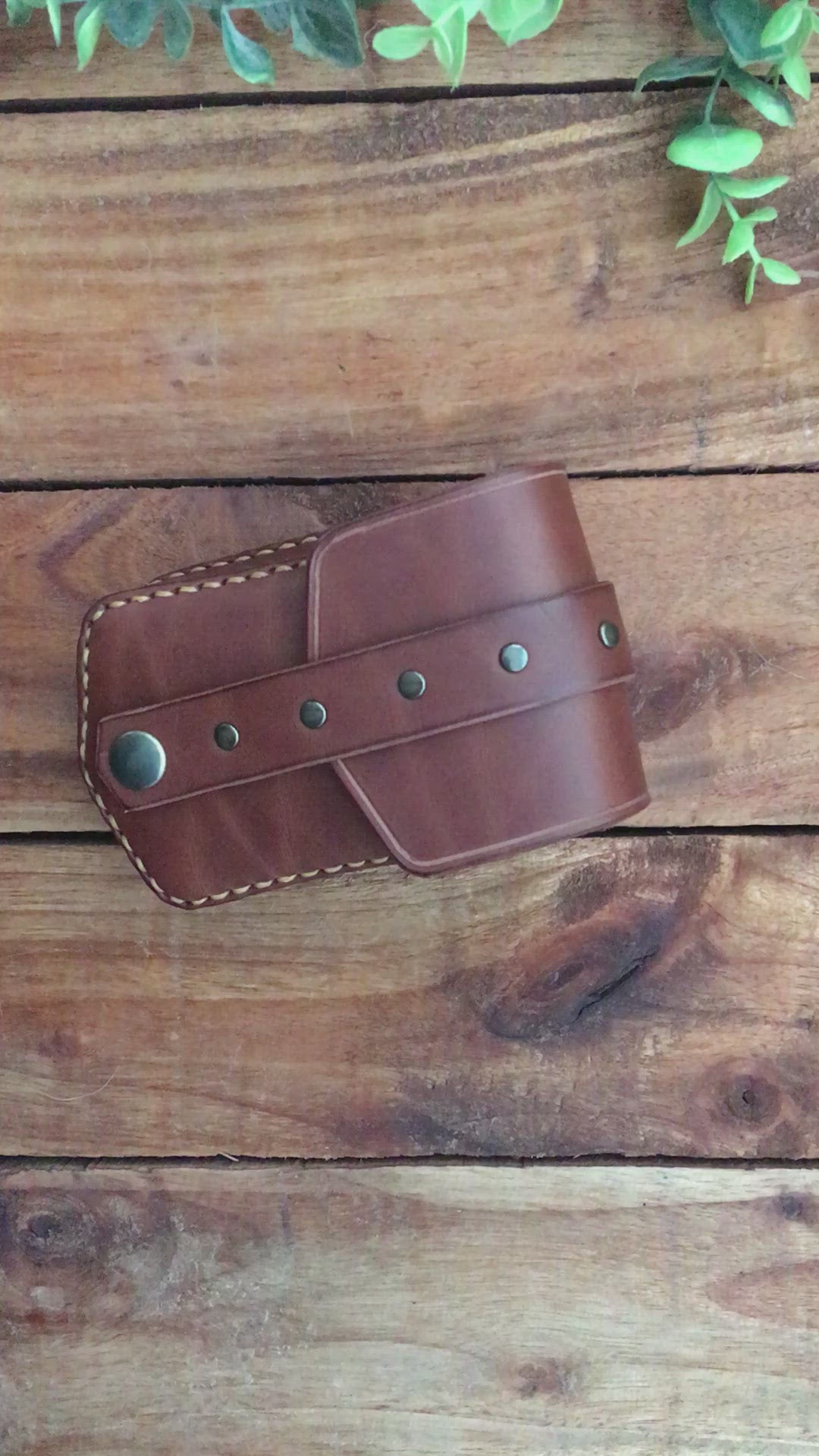 Video showing a Handmade Brown mini leather belt pouch for credit cards