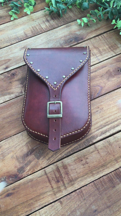 Video Showing a Large Handmade Mahogany Color Leather Belt Pouch with Buckle closing and Studs 