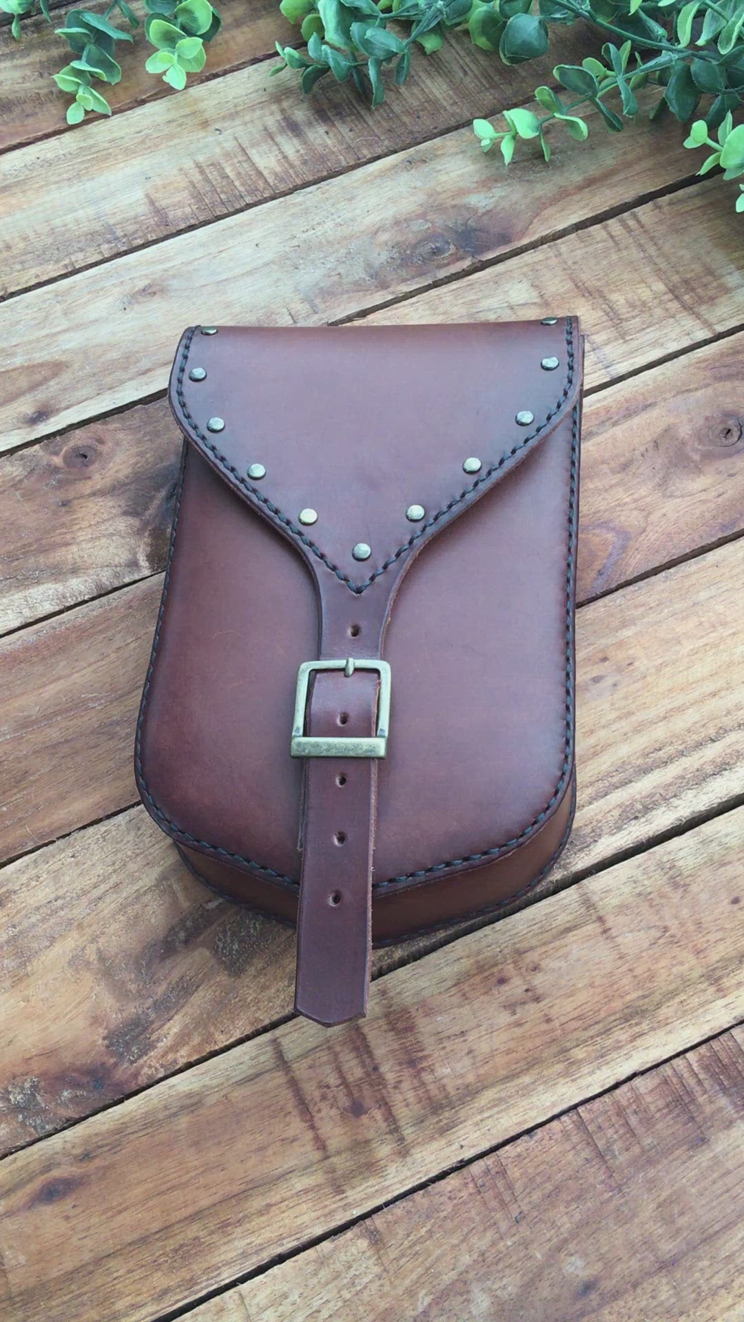 Video Showing a Large Handmade Brown Leather Belt Pouch with Buckle closing and Studs 