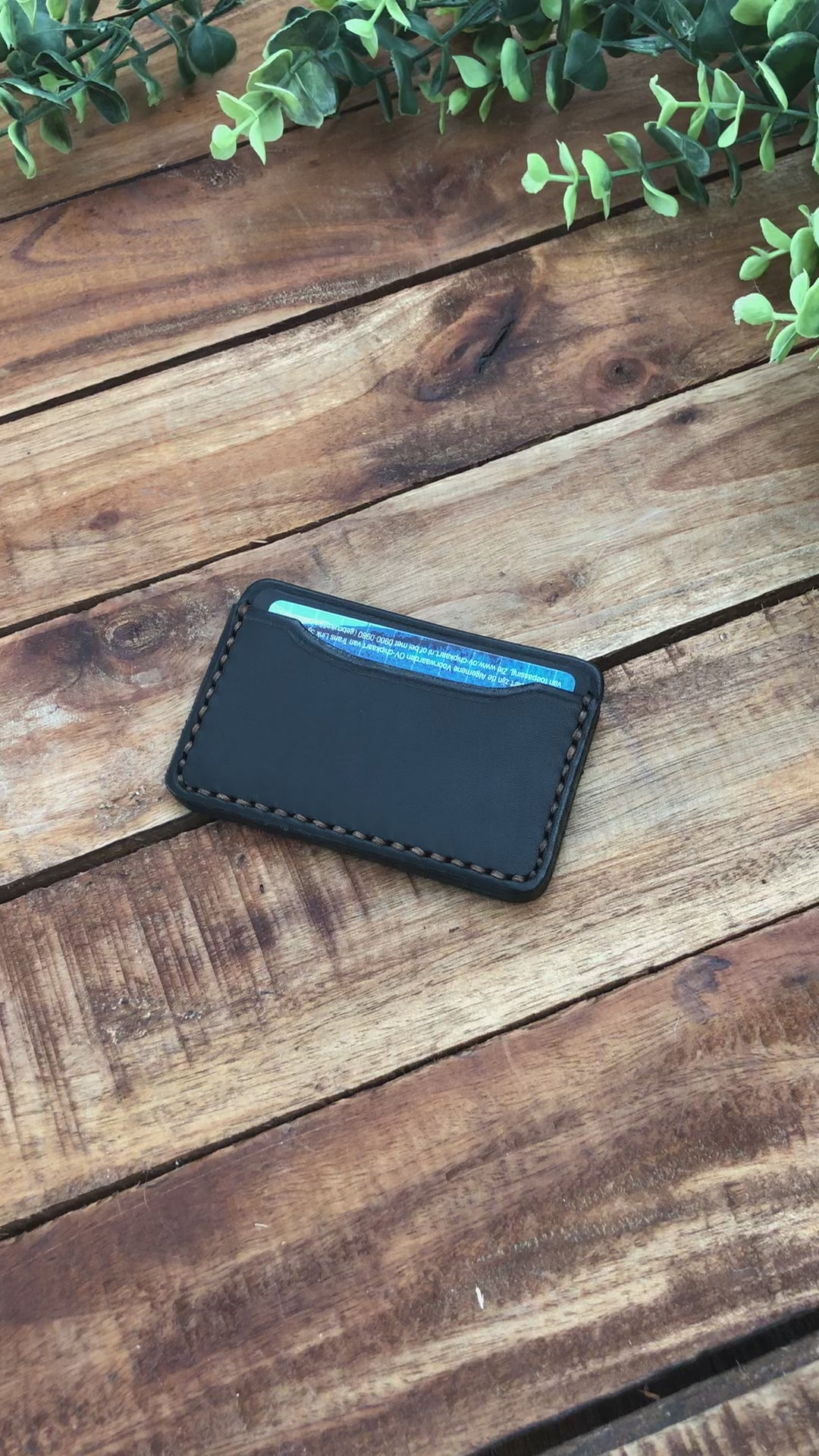 Video showing a Handmade Minimalist Black Leather Card Wallet