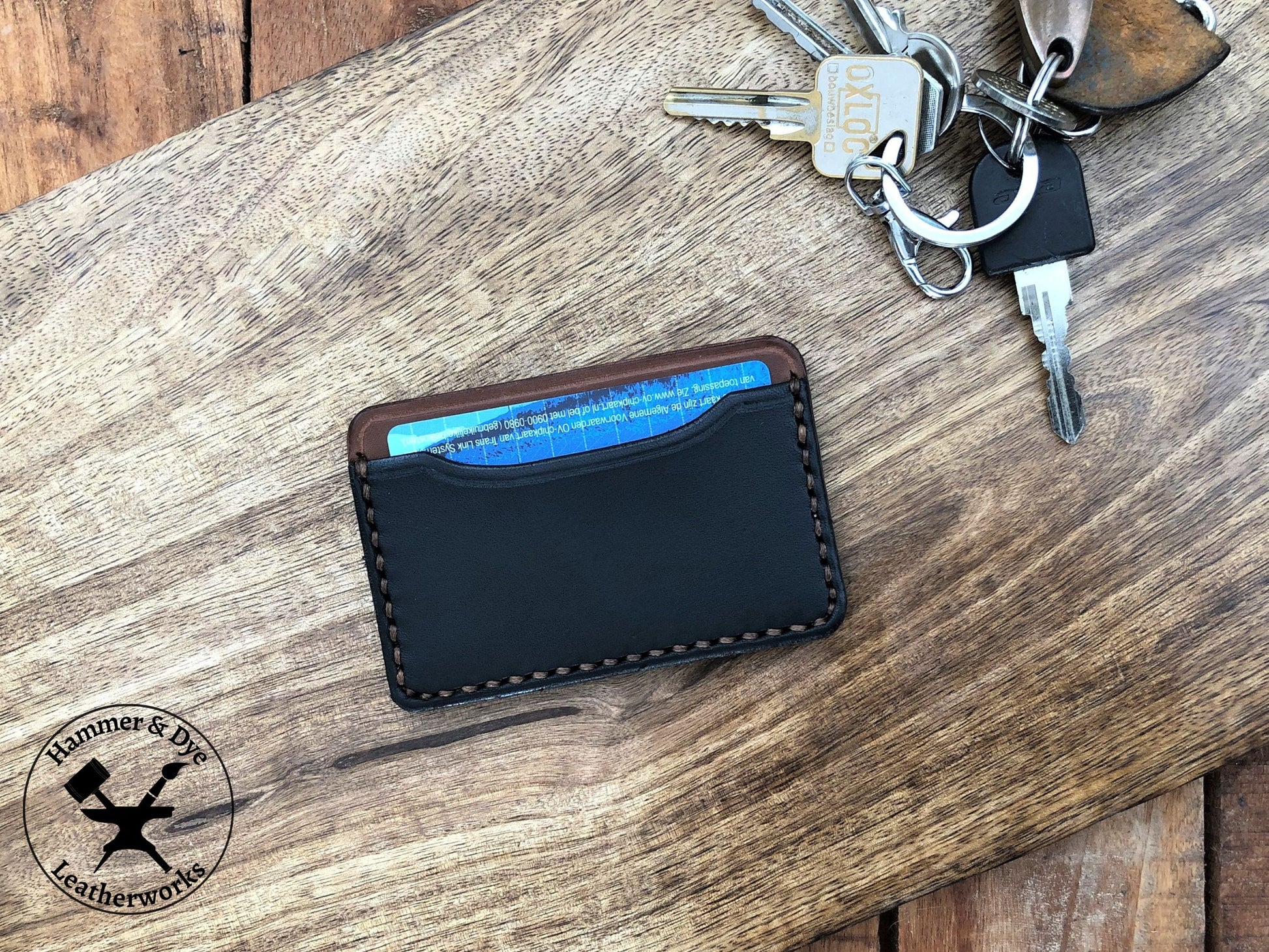 Minimalist Leather Card Wallet in Black and Brown next to some keys