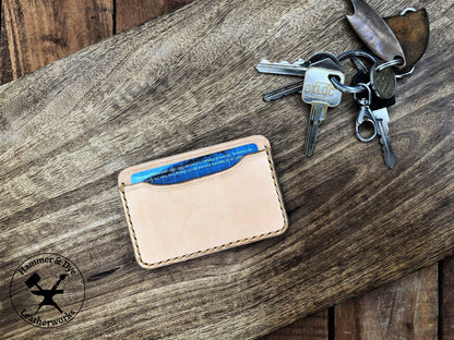 Handmade Minimalist Natural Leather Card Wallet with Hazel Stitching next to keys