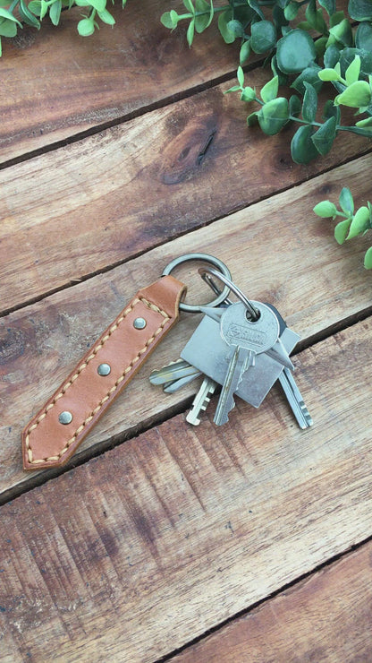 Video Showing a Handmade Tan Color Leather Studded Keychain with Hazel Stitching