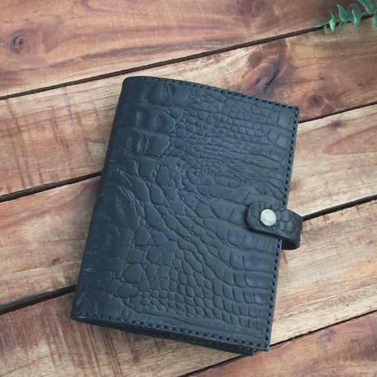 Video showing a handmade Black Leather Alligator Embossed Book Cover 