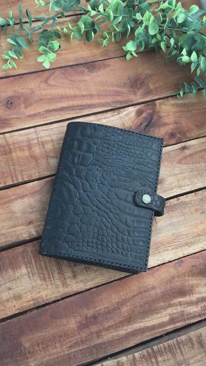 Video showing a handmade Black Leather Alligator Embossed Book Cover 