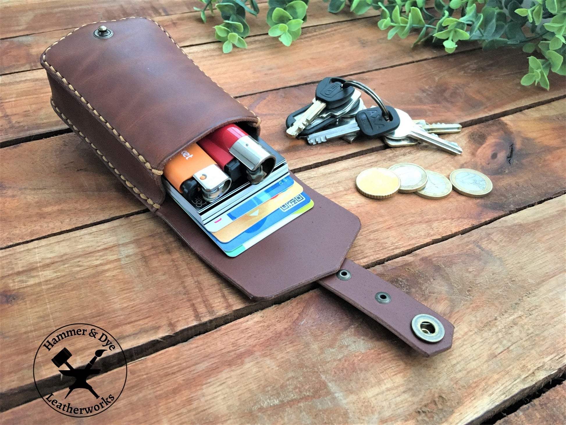 Handmade Brown mini leather belt pouch for credit cards shown full with cards and other items
