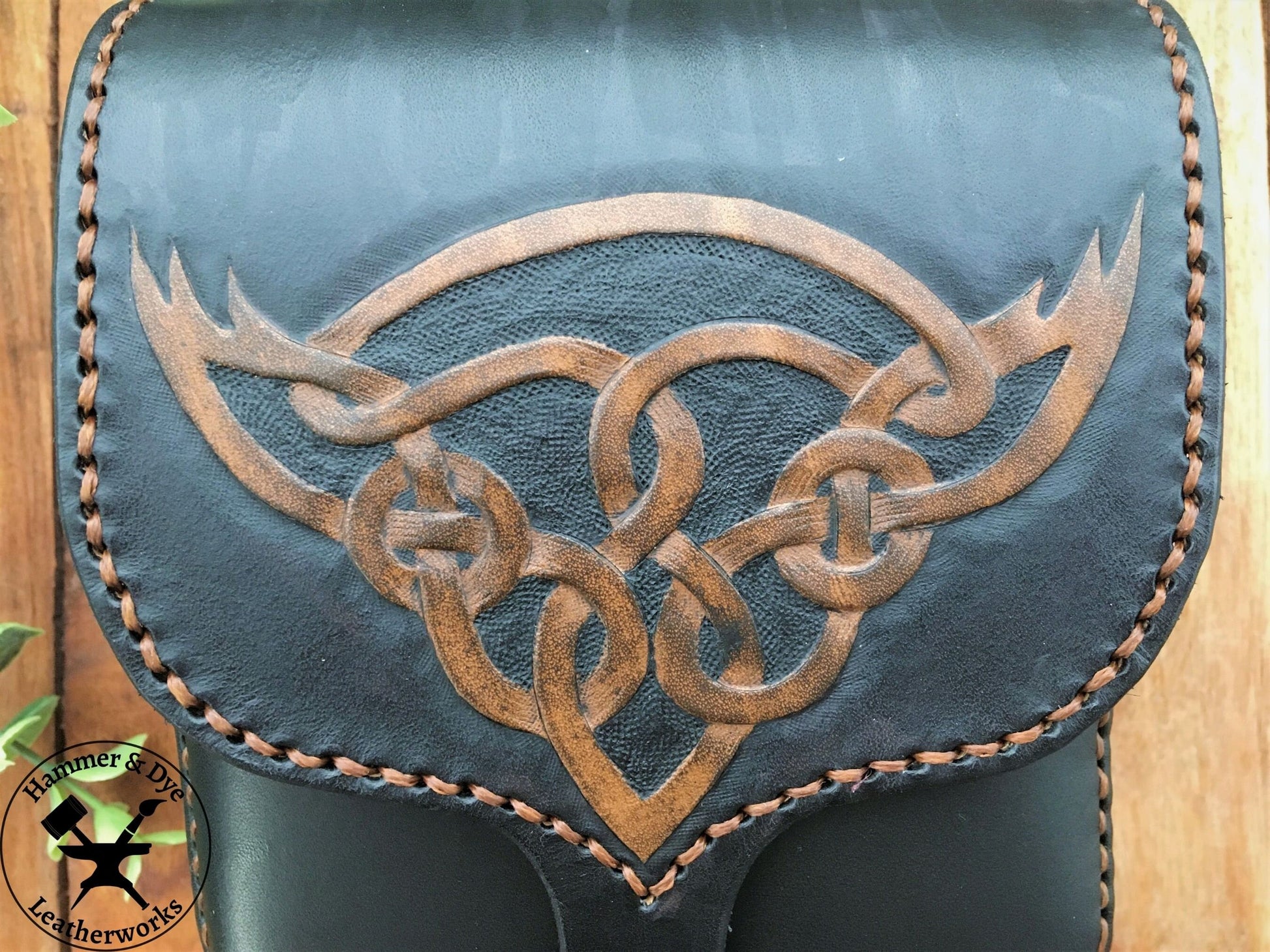 Handmade Black Leather Belt Pouch with Hand Carved Celtic Knotwork Design Close up of the carving 