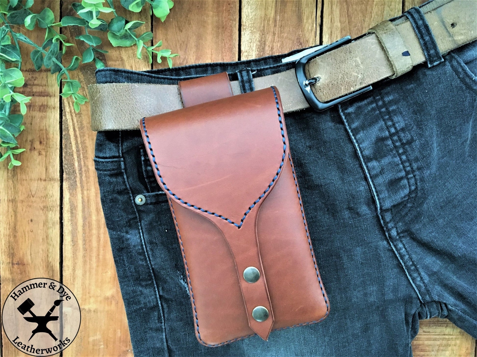 Handmade Brown Leather Festival Belt Pouch with Blue Stitching on a Trouser Belt