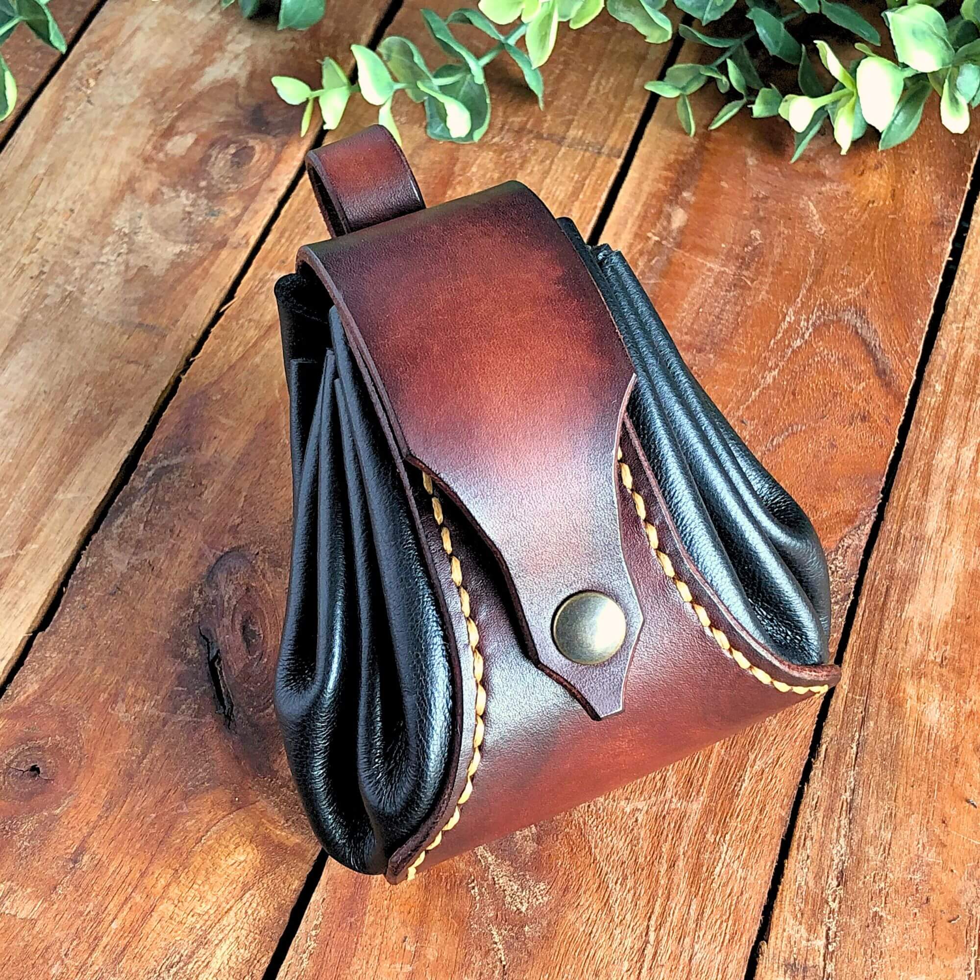Drawstring dice pouch in black and brown leather