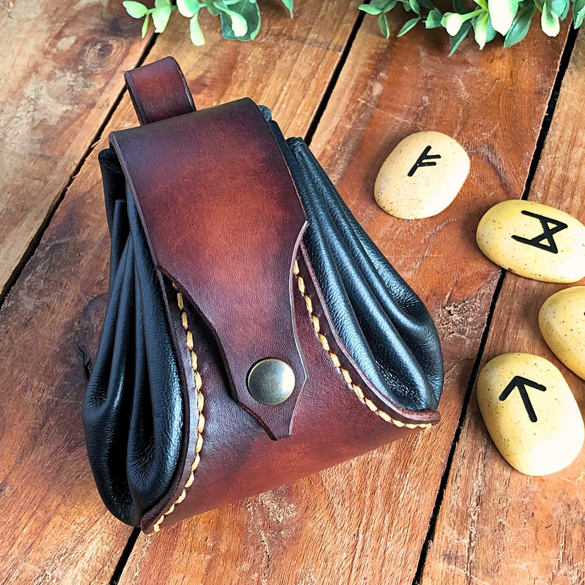 Small Wallet Bundle 18 Brown and black Leather drawstring dice pouch with rune stones next to it on a wooden background
