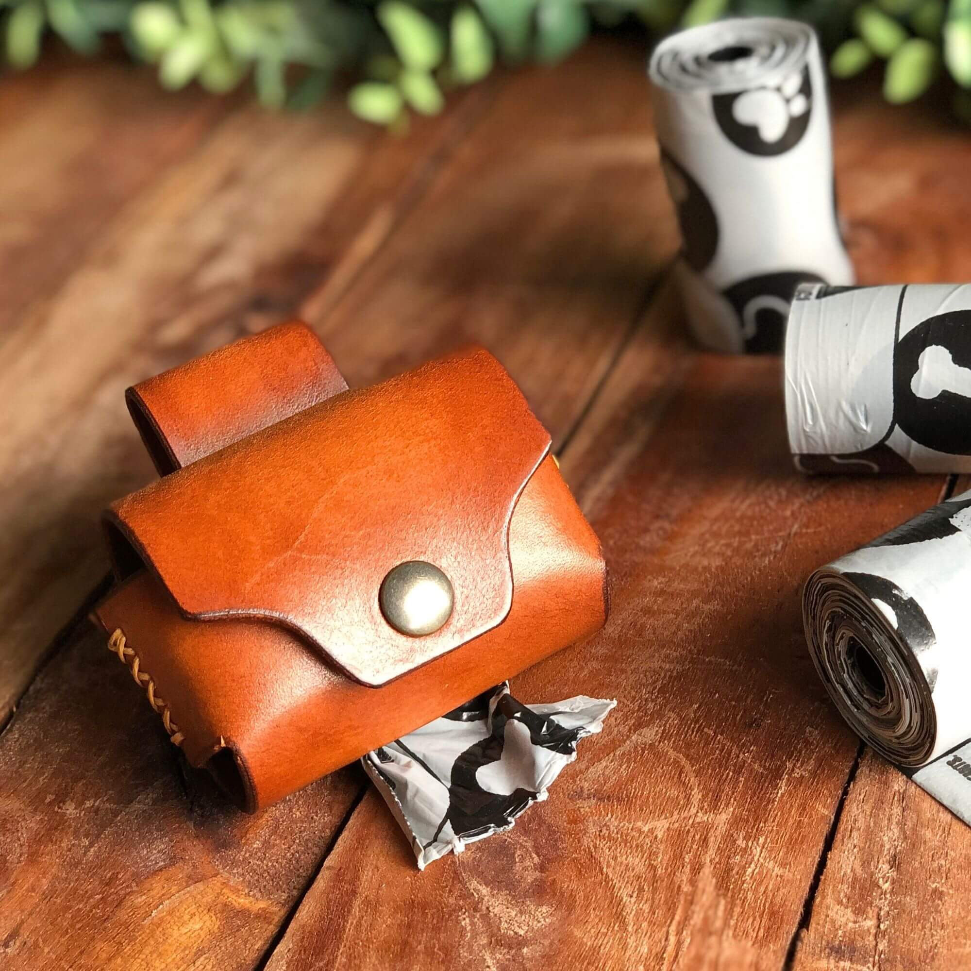 leathercraft pattern for a dog poop bag holder with a belt strap