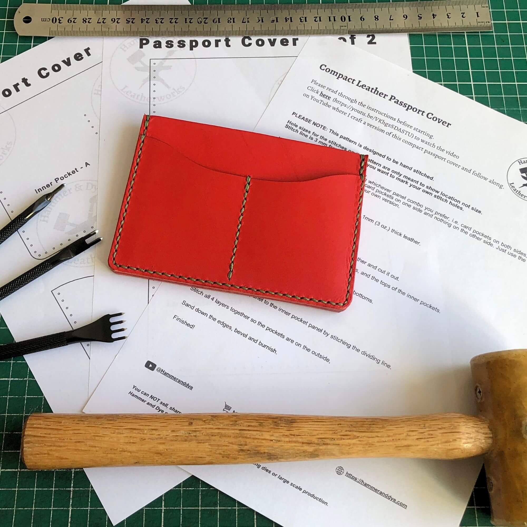 Compact Passport Cover 3 leathercraft pattern for a compact passport cover surrounded by leathercraft tools and the finished passport cover