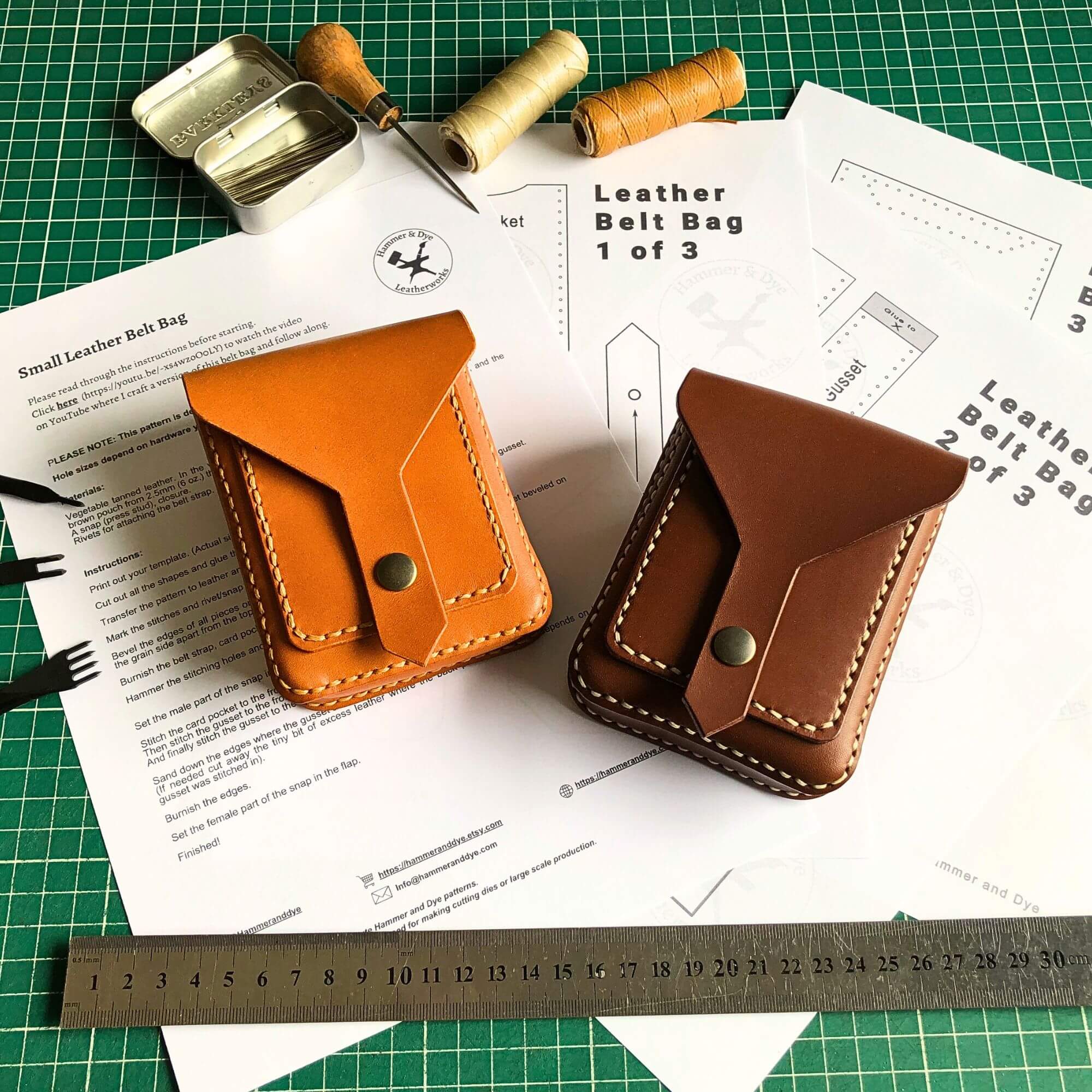 small belt bag pattern for beginners surrounded by tools and the finished belt bags