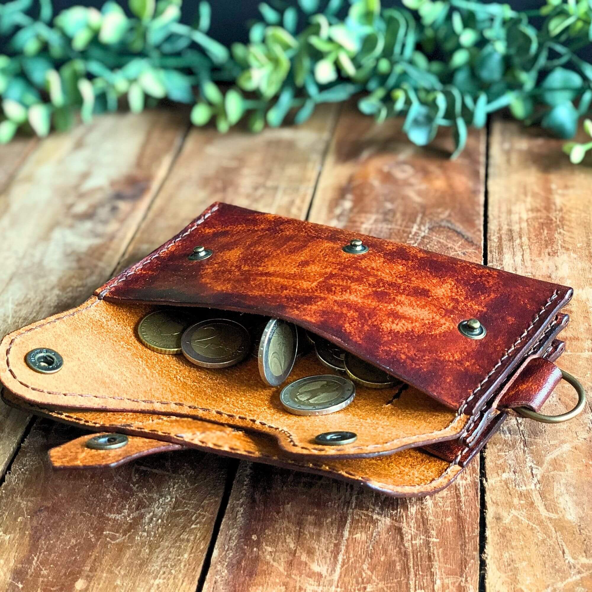 Leathercraft pattern for the dispatch wallet, showing coin pocket in use