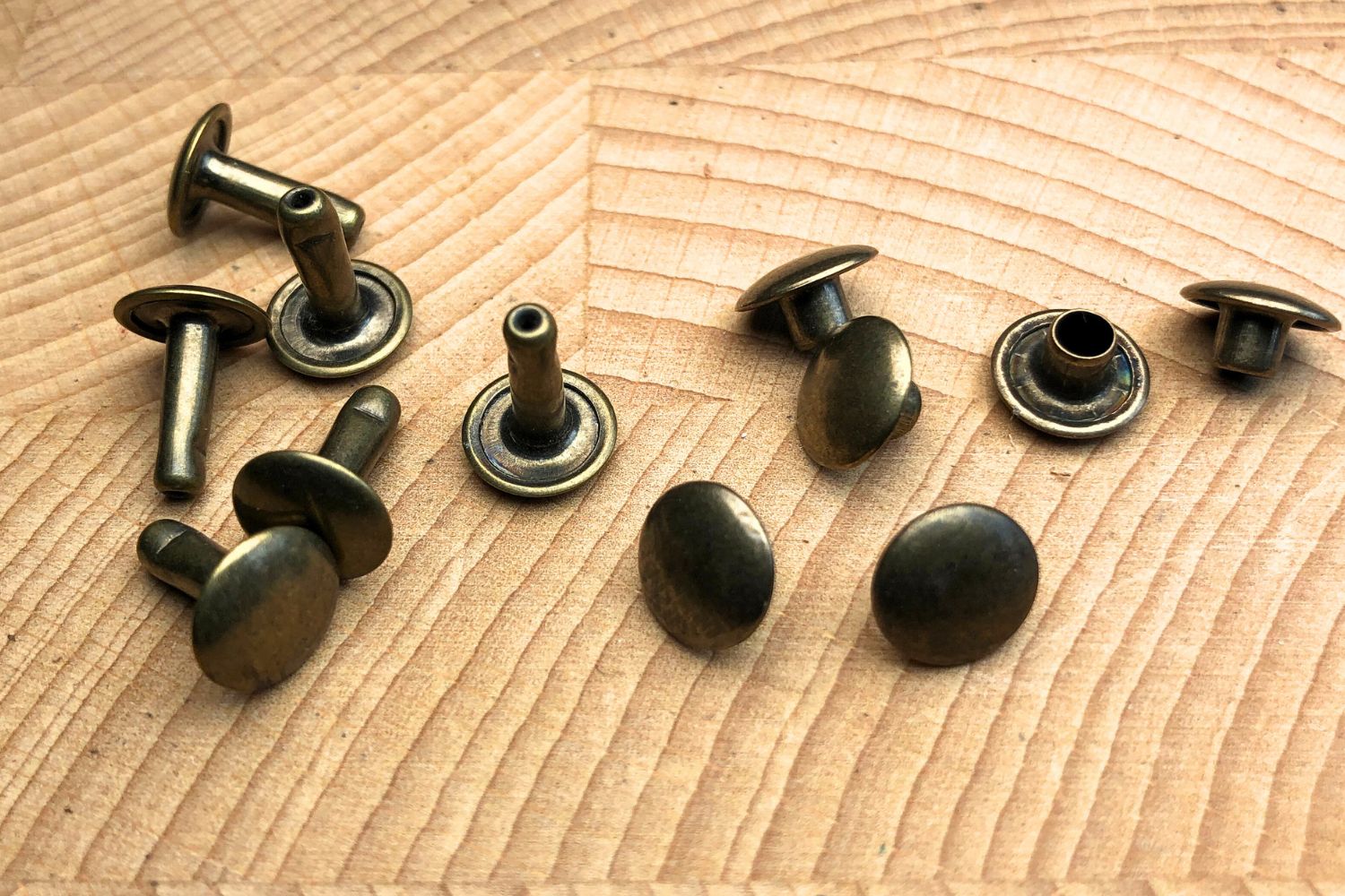 How to Set Rivets 4 bronze colored double cap rivets