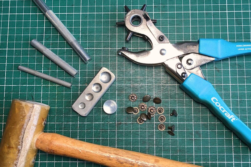 How to Set Rivets 6 Various tools are required to set rivets, such as a rivet setter and anvil, a hole punch and a mallet